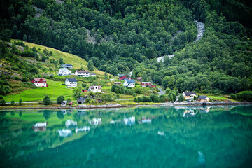 Beautiful scenery of houses on hillside of Lustrafjorden fjord in Norway