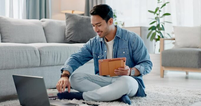 Home laptop, tablet and happy man typing, reading and check email communication, education blog and report study. Lounge floor, computer and student learning online news, knowledge or information