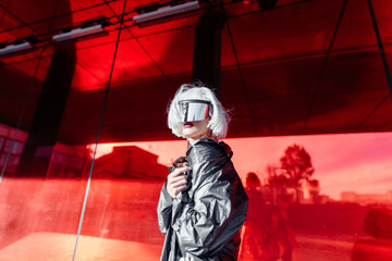 Stylish blonde on a red background.