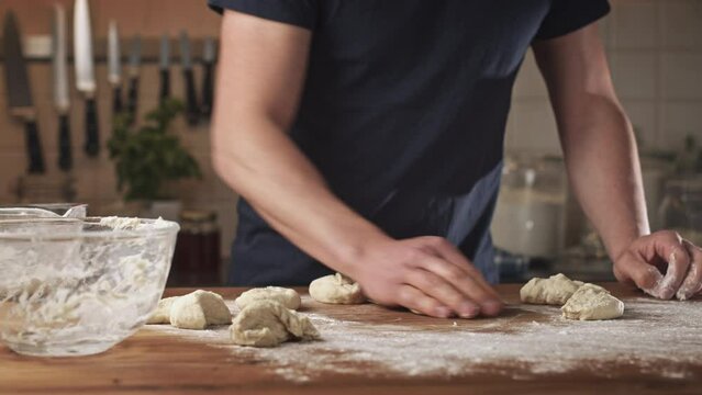 Home baking - making fresh Greek bagels or koulouri of Thessaloniki.