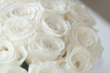 White roses Flower Arrangement in a glass vase