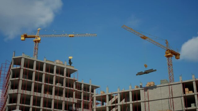 Working On Constraction Site Works Of New Skyscrapers. Urban Development Of High-Rise Towers And Building Activity
