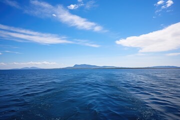 distant land viewed from a boat at sea