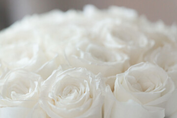 White roses Flower Arrangement in a glass vase