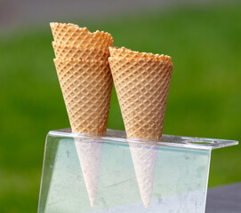 Two waffle ice cream cones