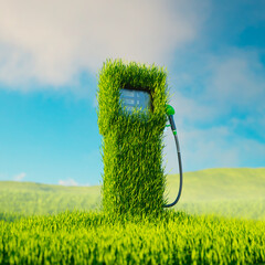 Fuel dispenser with a gas pump nozzle covered by green grass. Eco-friendly fuels