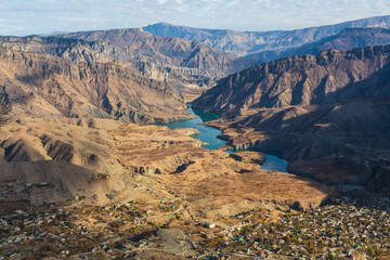 Mountainous landscape with a valley, river in autumn from Gunib fortress, Dagestan, Russia