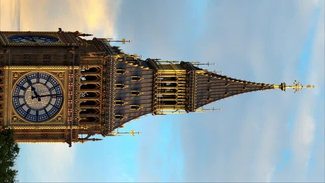 Vertical view of the Elizabeth Tower of the Westminster Palace in London downtown, United Kingdom. Slow motion