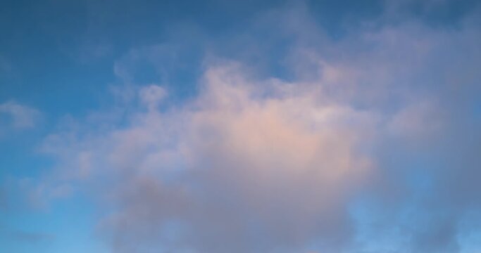 Blue sky white clouds. Puffy fluffy white clouds. Cumulus cloud cloudscape timelapse. Summer blue sky time lapse. Nature weather blue sky. White clouds background. Cloud time lapse , video loop