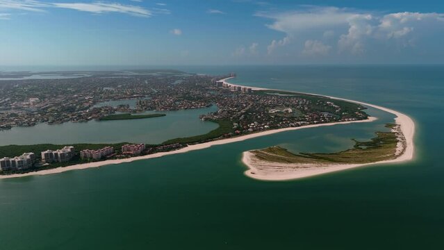 Aerial wide shot of The San Marco Island with residential mansions at daytime in Florida, USA. Drone Wide shot