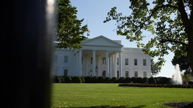 White House From Gate Bars in Slow Motion
