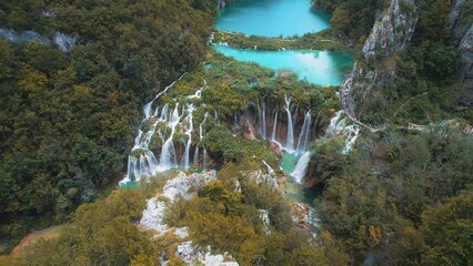Autumn Plitvice Lakes National Park in Croatia. Picturesque tufa lakes, caves, connected by...