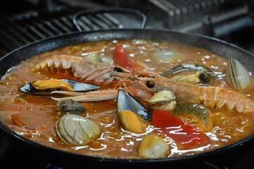 seafood paella in a pan