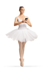 Naklejka premium Full length shot of a ballerina using a smartphone
