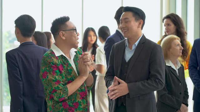 group of diversity business people shaking hands and greeting each other after a meeting conference or seminar. Communication in Corporate at office. connecting people. asian people talking