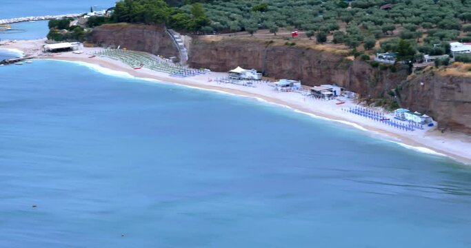 Aerial view of high white cliffs of Vignanotica beach in Apulia region, Italy