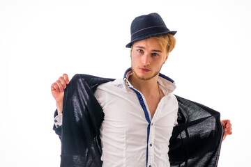 A man with a hat and a jacket on. Photo of a stylish man wearing a hat and jacket with a cool and confident demeanor