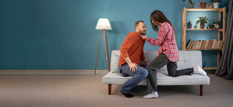 Emotional Annoyed Stressed Couple Arguing At Home. Angry Irritated Nervous Woman Shouting On Man, Figuring Out Relations. Relationship Problems Concept.