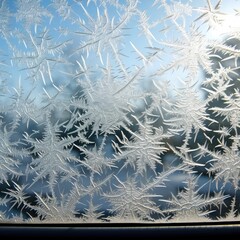 Winter's Artistry: Abstract ice textures adorn a car window, capturing the beauty of frost and cold in intricate patterns