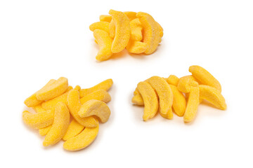 Juicy colorful jelly banana sweets isolated on white.