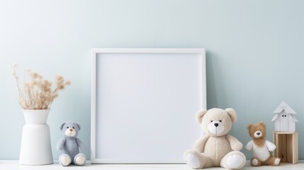Baby layout featuring children toys including a teddy bear and framed on a light wall background, copy space mockup concept