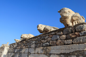 The top of a column capital of the Ionic order on the ruins of the ancient city of Ephesus