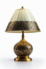 Retro brass table lamp with detailed engraving isolated on a white background 