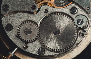 Fototapeta na wymiar The mechanism of an antique clock close-up