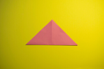 Step by step photo instruction how to make origami paper pig. Simple diy kids children's concept.