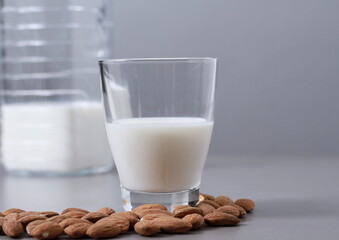 Almond milk with almond nuts on table no people stock image stock photo