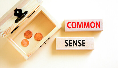 Common sense symbol. Concept words Common sense on beautiful wooden block. Beautiful white table...