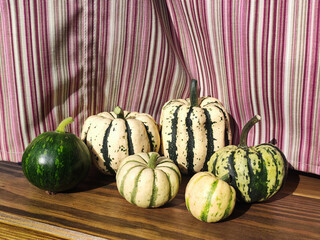 decorative pumpkins on the wooden floor