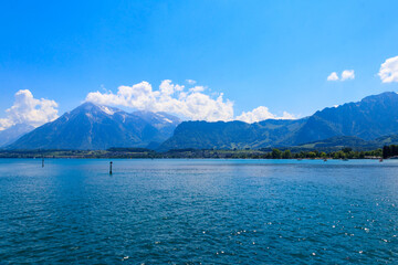 Obraz premium View of the Annecy lake surrounded by beautiful mountains in Annecy, France