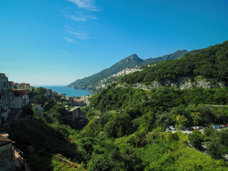 Fototapeta premium Panoramic view of Positano with comfortable beaches and blue sea on Amalfi Coast in Campania, Italy. Amalfi coast is popular travel and holyday destination in Europe.