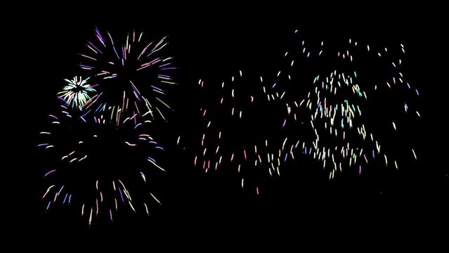 Firework with alpha channel background - Transparent colourful burst of festive fireworks in sky. 3d render animation