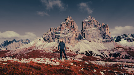 Amidst the rugged grandeur of the mountains, a lone adventurer embarks on a journey of discovery.
