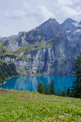 
Oeschinensee, often referred to as Oeschinen Lake, is a picturesque alpine lake nestled in the Swiss Alps.