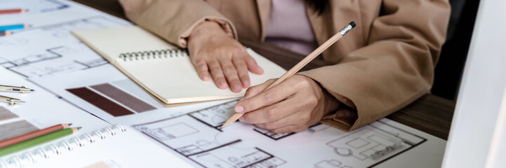Architect working on the desk, construction project ideas architecture engineer Concept.