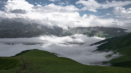 Fototapeta na wymiar Cloudy Kazbegi Mountain in Stepantsminda Georgia