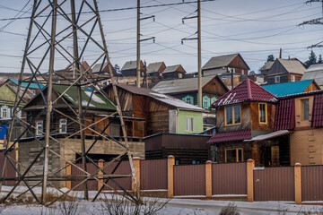 The brick and wooden houses with slate roofs in the residential neighborhood of Ulan-Ude, Buryatia, Russia.