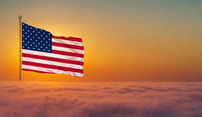 American flag waving in beautiful clouds.