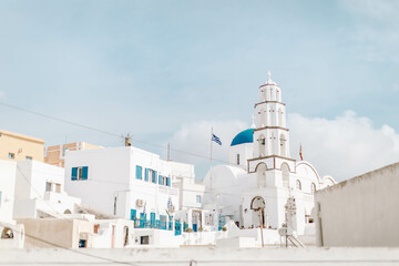 Travel mediterranean aegean of traditional cycladic Santorini white houses. View of Oia town in Santorini island in Greece.