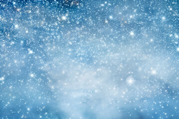 Obraz premium Beautiful Christmas background with bright flowers, snowflakes and bokeh effect.