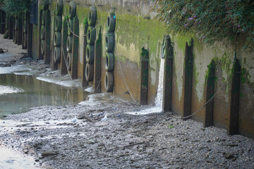 Excess raw, untreated sewage being spilled at the river Thames in London