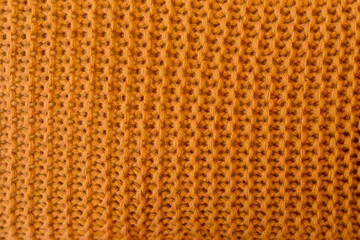 Closeup od brown knitted material - obrazy, fototapety, plakaty