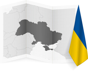 Ukraine grayscale map and hanging flag.