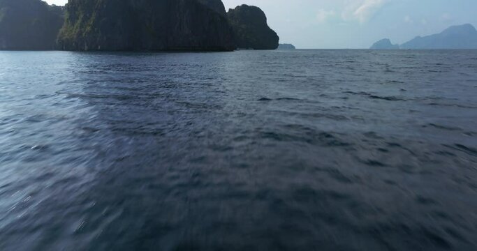 Drone view above the sea of a rock formation in El Nido, Palawan, Philippines