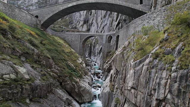 Aerial view of Devil's Bridge (Teufelsbrucke) over of Schollenen Gorge (Schollenenschlucht) in Andermatt, Switzerland