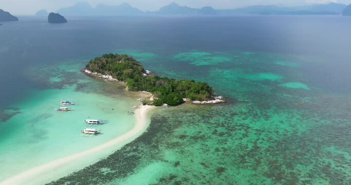 Drone view above the sea of Snake island, El Nido, Palawan, Philippines