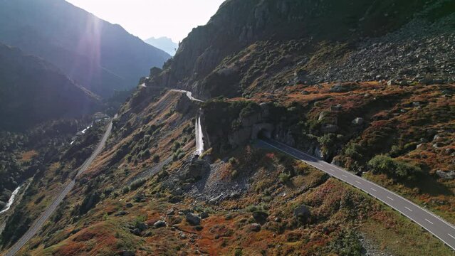 Aerial view of waterfall over road tunnel in Susten Pass, Switzerland